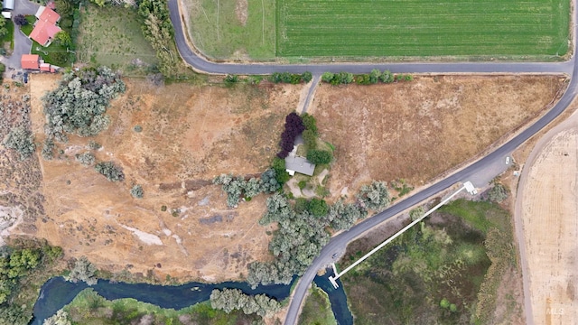 birds eye view of property featuring a rural view