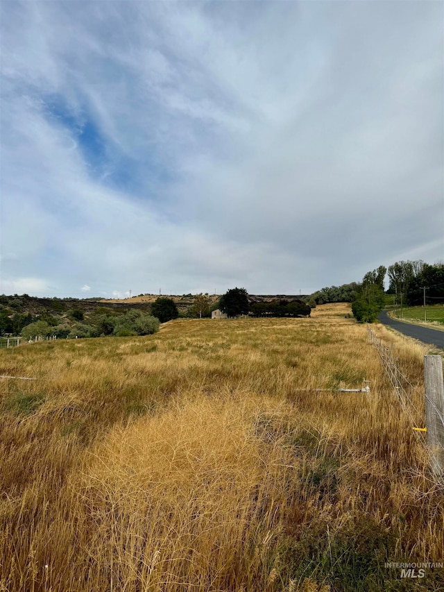 view of landscape featuring a rural view