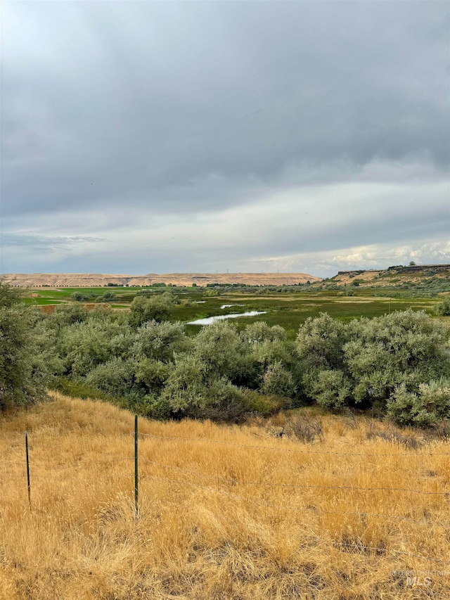 view of mountain feature featuring a rural view