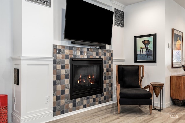 sitting room featuring hardwood / wood-style floors