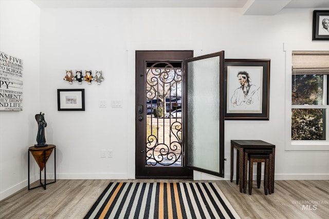 entryway with light wood-type flooring