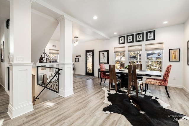 dining space with light hardwood / wood-style flooring