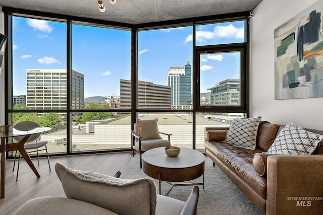 851 W Front St Unit 607, Boise, ID 83702 - living area with expansive windows, a city view, and wood finished floors