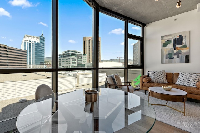 851 W Front St Unit 607, Boise, ID 83702 - dining room featuring expansive windows, wood finished floors, and a city view