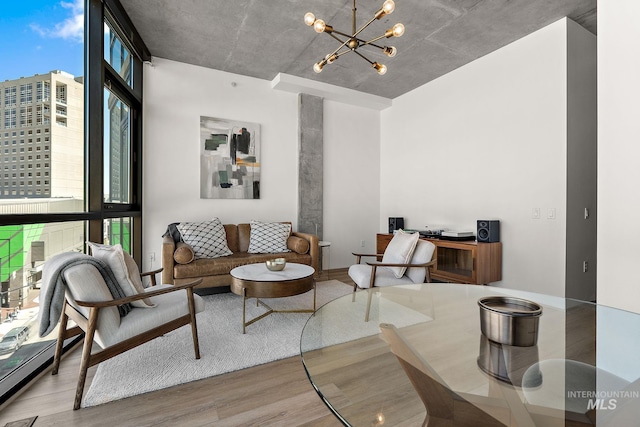 851 W Front St Unit 607, Boise, ID 83702 - living area with wood finished floors, a chandelier, and expansive windows