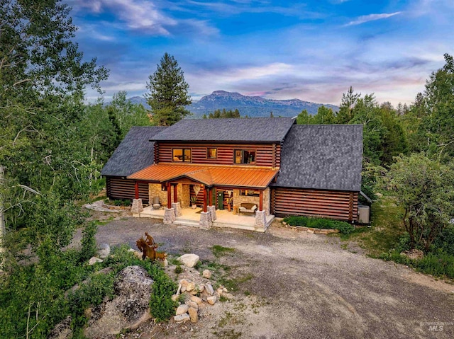 14051 Deerfield Rd, Mccall, ID 83638 - cabin featuring driveway, log siding, and stone siding