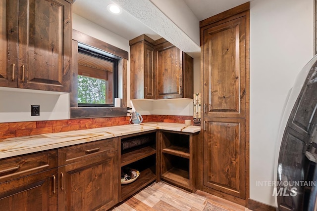 14051 Deerfield Rd, Mccall, ID 83638 - kitchen with light countertops, light wood-style flooring, and open shelves