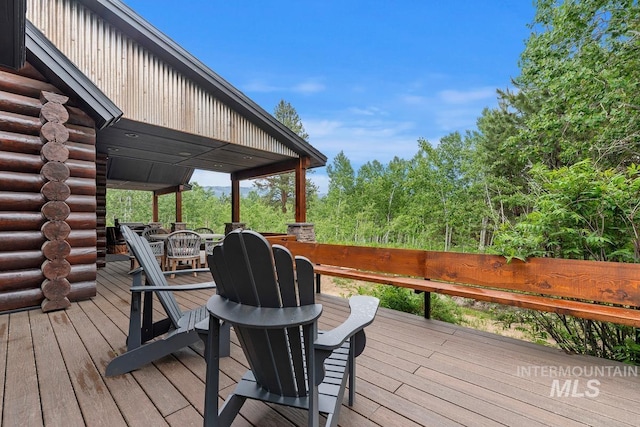 14051 Deerfield Rd, Mccall, ID 83638 - wooden terrace with outdoor dining area