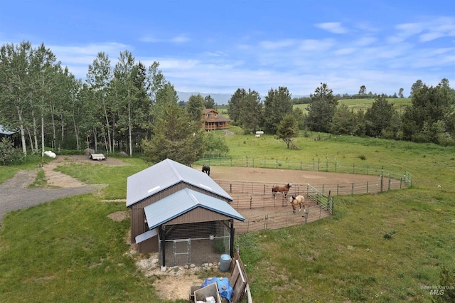 14051 Deerfield Rd, Mccall, ID 83638 - view of yard with exterior structure, an outbuilding, and a rural view
