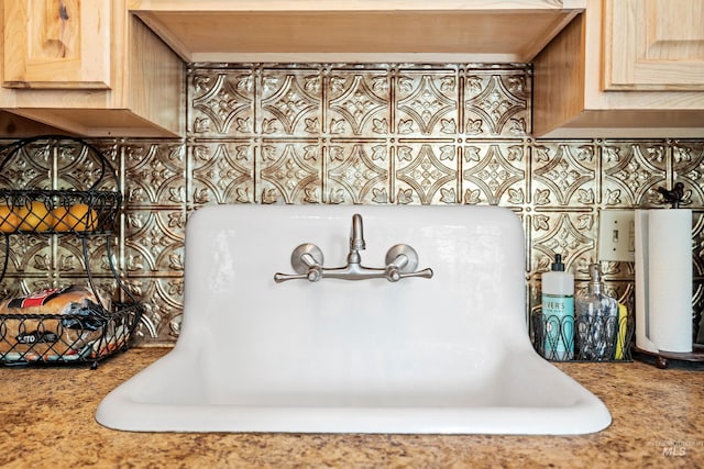 details featuring light brown cabinetry