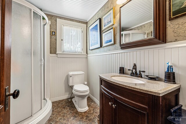 bathroom featuring a shower with door, vanity, toilet, and wood ceiling