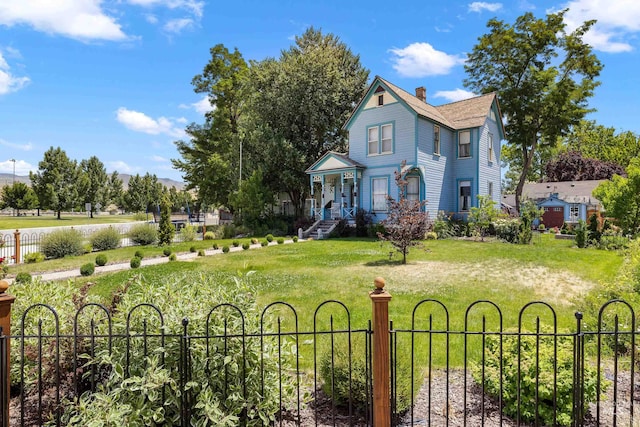 view of front of home with a front yard