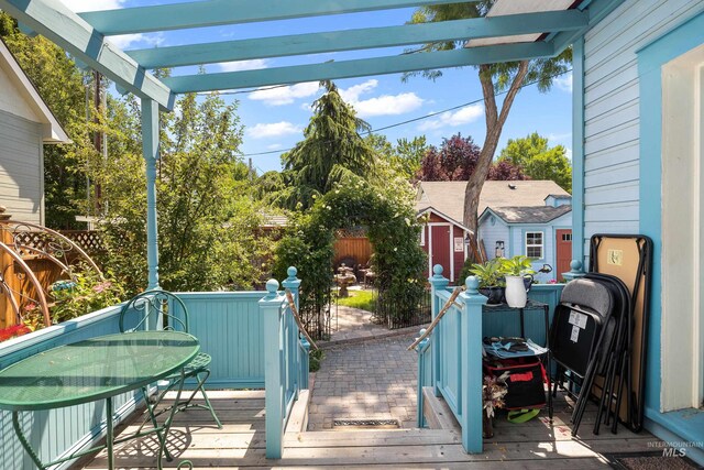 wooden terrace featuring a pergola