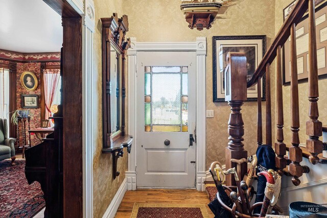 entrance foyer featuring light wood-type flooring