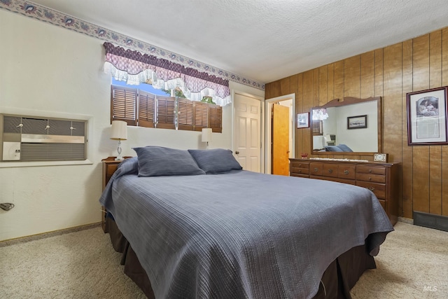 93 S Lancaster Dr, Nampa, ID 83651 - bedroom featuring carpet flooring, wood walls, baseboards, and a textured ceiling