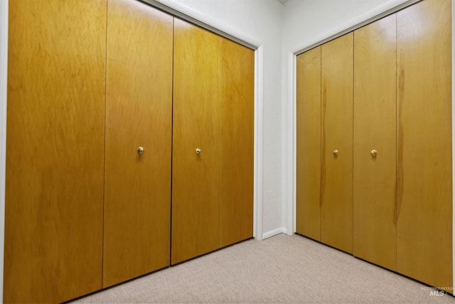 93 S Lancaster Dr, Nampa, ID 83651 - unfurnished bedroom featuring light carpet and a closet