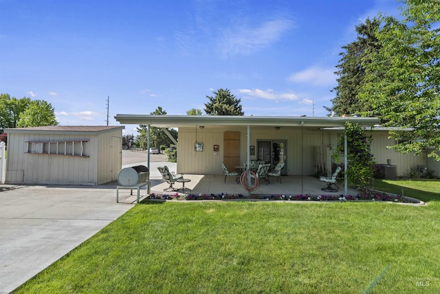 93 S Lancaster Dr, Nampa, ID 83651 - back of property with a lawn, a patio, and central air condition unit