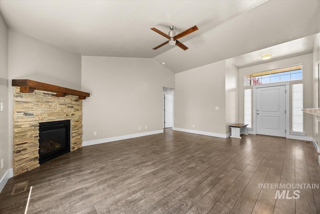 4991 N Sun Shimmer Ave, Meridian, ID 83646 - unfurnished living room featuring vaulted ceiling, a ceiling fan, dark wood finished floors, and baseboards