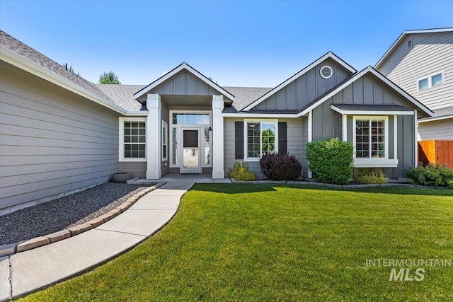 4991 N Sun Shimmer Ave, Meridian, ID 83646 - view of front facade featuring board and batten siding and a shingled roof