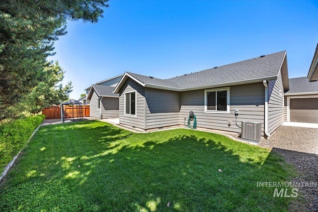 4991 N Sun Shimmer Ave, Meridian, ID 83646 - back of property featuring central air condition unit and roof with shingles