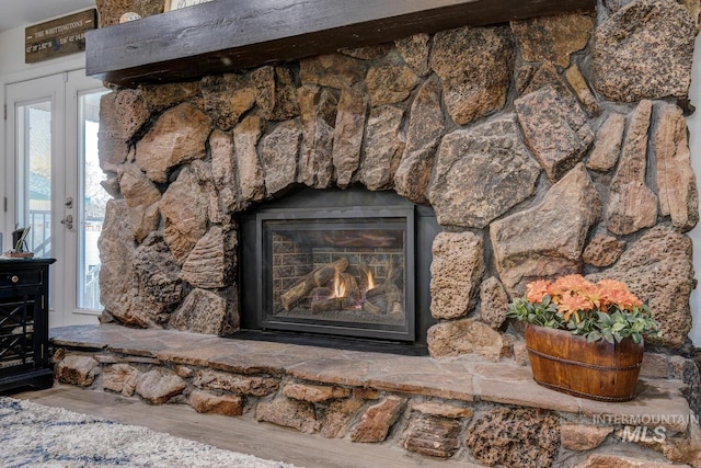 room details featuring a stone fireplace