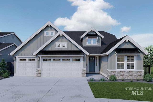 craftsman-style house featuring concrete driveway, board and batten siding, and stone siding