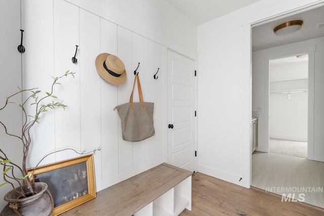 mudroom featuring light wood-style floors