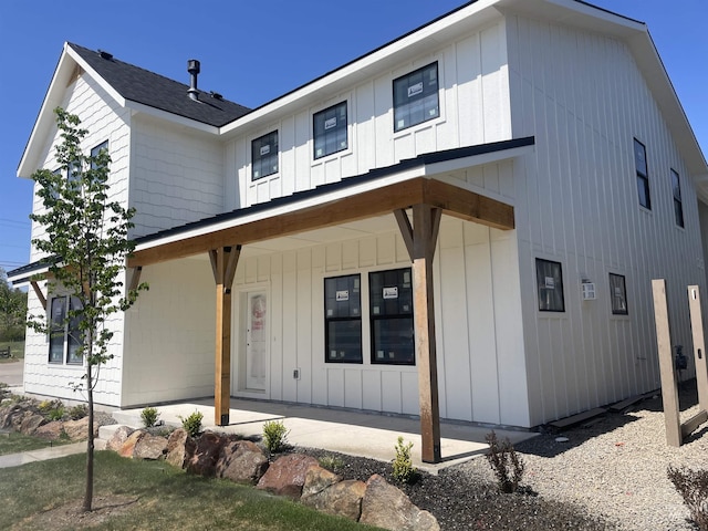 1640 E Cutgrass Ln, Eagle, ID 83616 - modern farmhouse featuring covered porch and board and batten siding