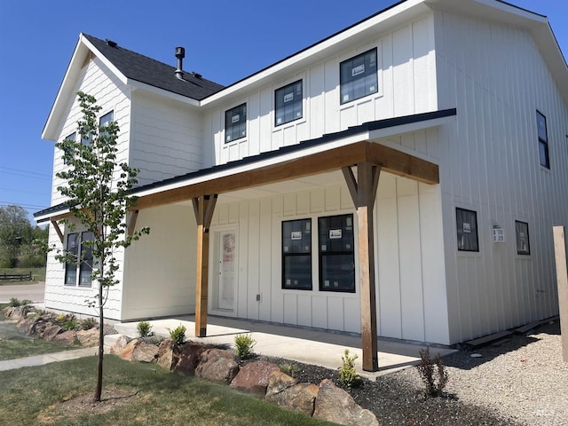 1640 E Cutgrass Ln, Eagle, ID 83616 - modern farmhouse with a porch and board and batten siding