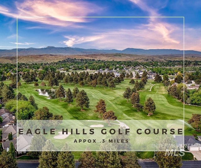 1640 E Cutgrass Ln, Eagle, ID 83616 - view of mountain backdrop featuring a golf course and a nearby body of water