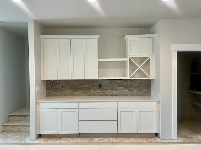 1640 E Cutgrass Ln, Eagle, ID 83616 - kitchen featuring light countertops, white cabinetry, decorative backsplash, and open shelves