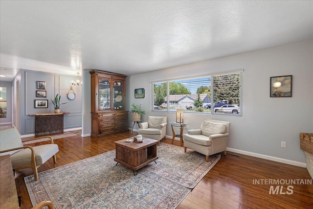 539 Rimview Dr, Twin Falls, ID 83301 - living area featuring hardwood / wood-style floors and a textured ceiling