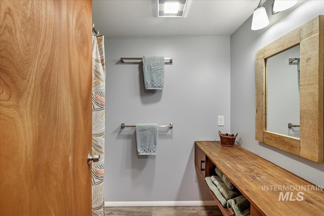 539 Rimview Dr, Twin Falls, ID 83301 - bathroom featuring baseboards and vanity
