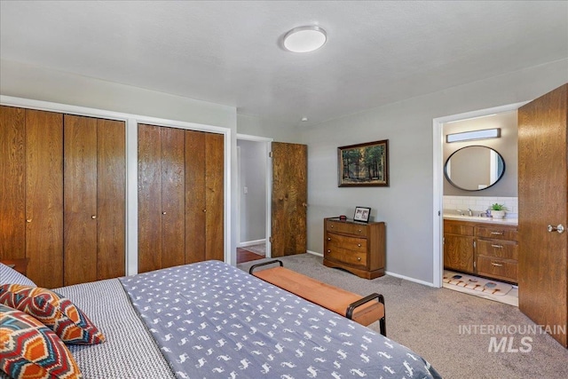 539 Rimview Dr, Twin Falls, ID 83301 - carpeted bedroom with two closets and ensuite bath