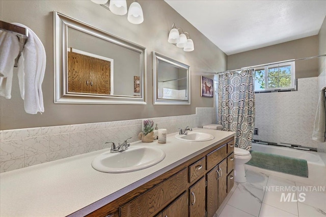 539 Rimview Dr, Twin Falls, ID 83301 - full bathroom with shower / tub combo with curtain, double vanity, and marble finish flooring