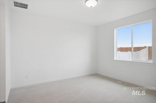 5485 N Patimos Ave, Meridian, ID 83646 - spare room with visible vents, baseboards, and light carpet
