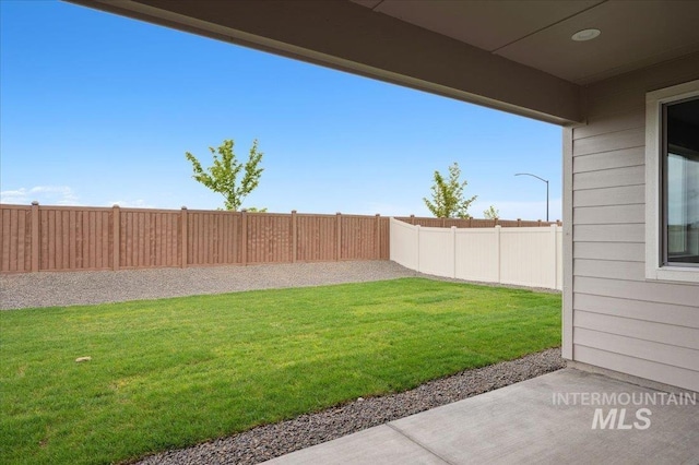5485 N Patimos Ave, Meridian, ID 83646 - view of yard featuring a fenced backyard and a patio area