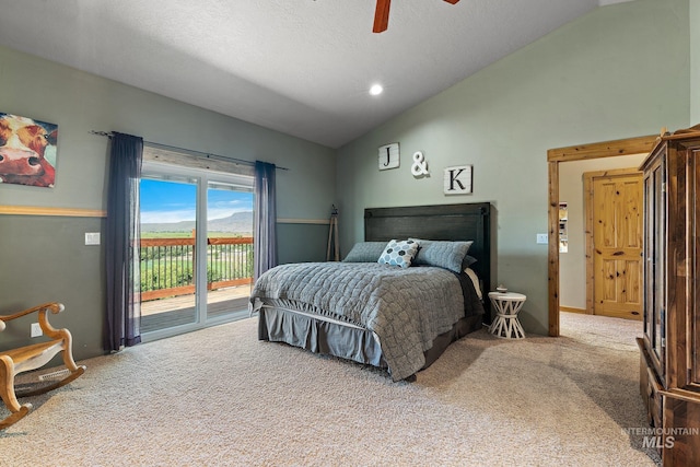 carpeted bedroom featuring vaulted ceiling, a textured ceiling, access to outside, and ceiling fan