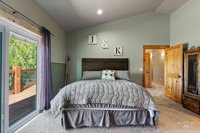 carpeted bedroom featuring vaulted ceiling