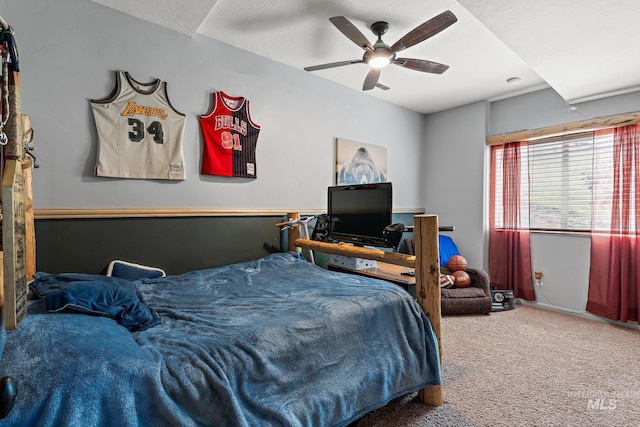 bedroom with ceiling fan and carpet floors