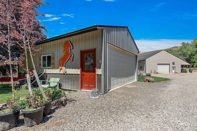 view of outbuilding featuring a garage