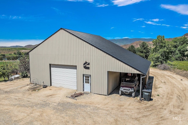 garage featuring a mountain view