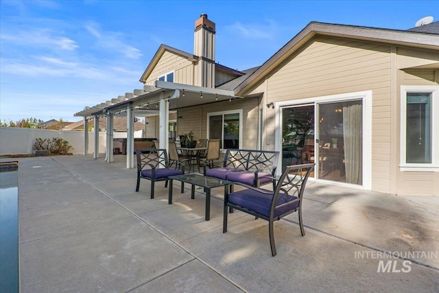 view of patio with fence