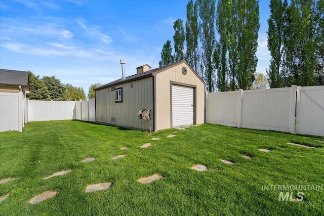 view of shed with a fenced backyard