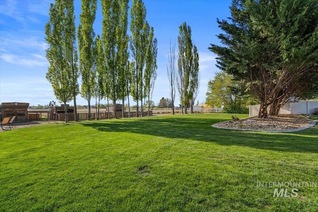 view of yard with fence