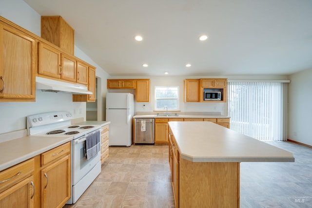 kitchen with under cabinet range hood, a sink, a kitchen island, stainless steel appliances, and light countertops