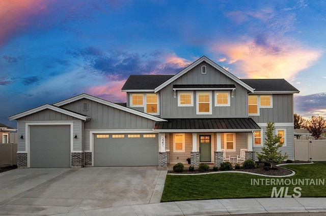 2251 N Garnet Creek Ave, Star, ID 83669 - craftsman-style home featuring a garage, a porch, a standing seam roof, driveway, and board and batten siding