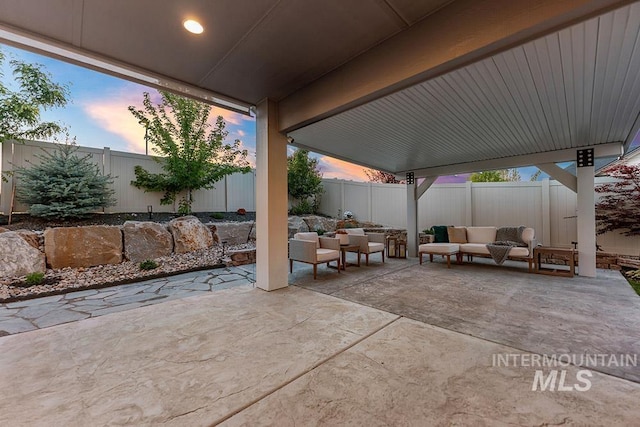 2251 N Garnet Creek Ave, Star, ID 83669 - fenced backyard featuring an outdoor hangout area and a patio
