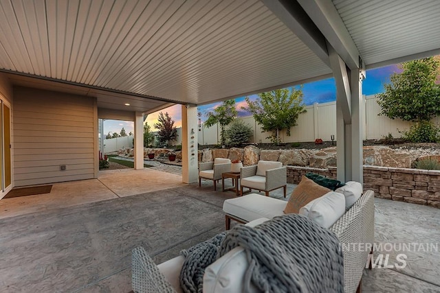 2251 N Garnet Creek Ave, Star, ID 83669 - fenced backyard featuring an outdoor hangout area and a patio
