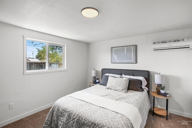 905 E 2nd St, Emmett, ID 83617 - carpeted bedroom featuring a wall unit AC and baseboards
